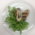 Kalamata and Spinach Stuffed Grilled Chicken over a bed of Mache Lambs Kalamata and Spinach Stuffed Grilled Chicken over a bed of Mache Lambs